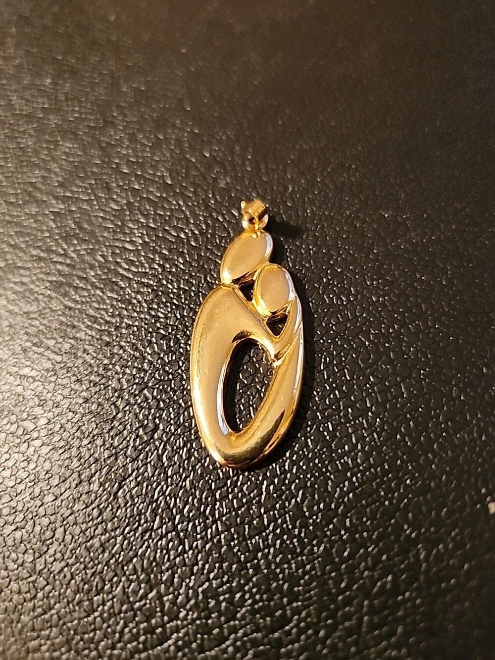 Gold Tone Mother's And Child Pendant/Charm